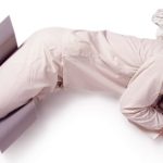 Man using the Side Sleeper Snoring Relief Leg Support available online and in-store at The Back and Neck Bed Shop