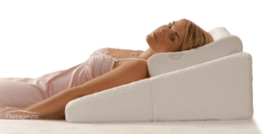 Woman lying on a Wedge pillow