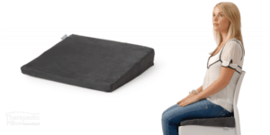 woman seating on an angled posture seat cushion